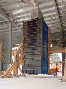 Container tilter is loading goods in the factory